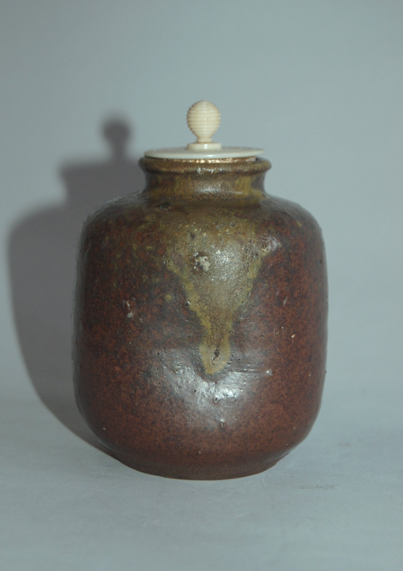 Antique ceramic chaire tea caddy, dark brown glaze, yellow drip, possibly Seto ware, Japan