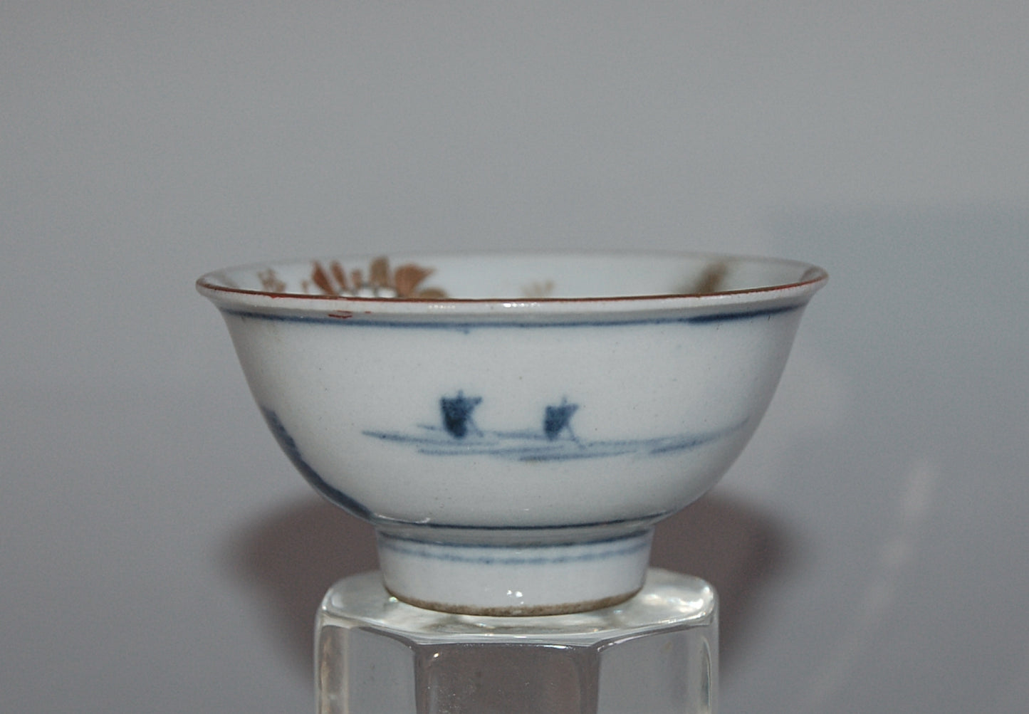 Pair of porcelain sake cups, birds, flowers, butterflies, riverscape, Kutani, Japan