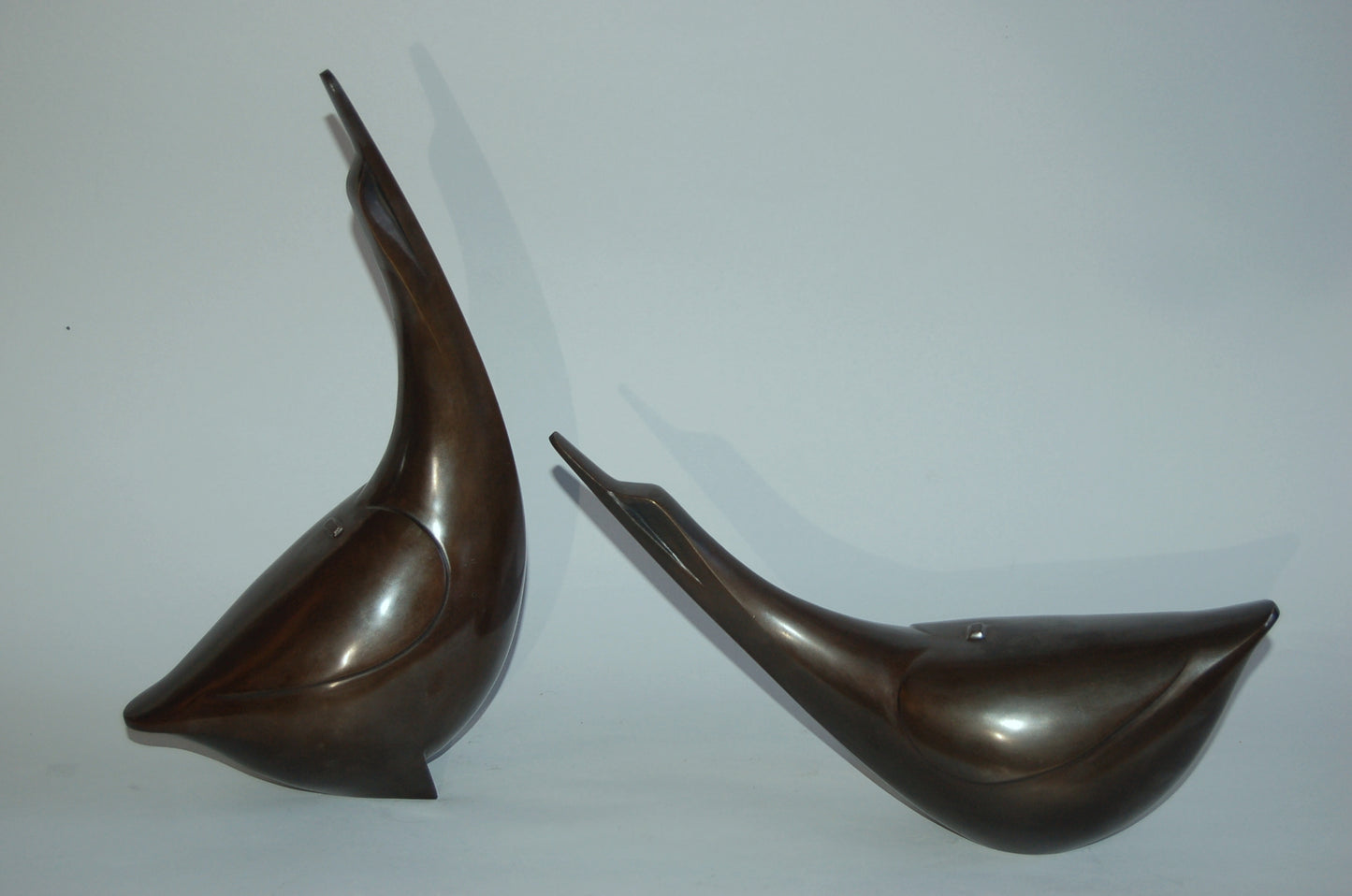 Pair of abstracted geese, dynamic bronze sculpture, by Saegusa Sotaro, Japan