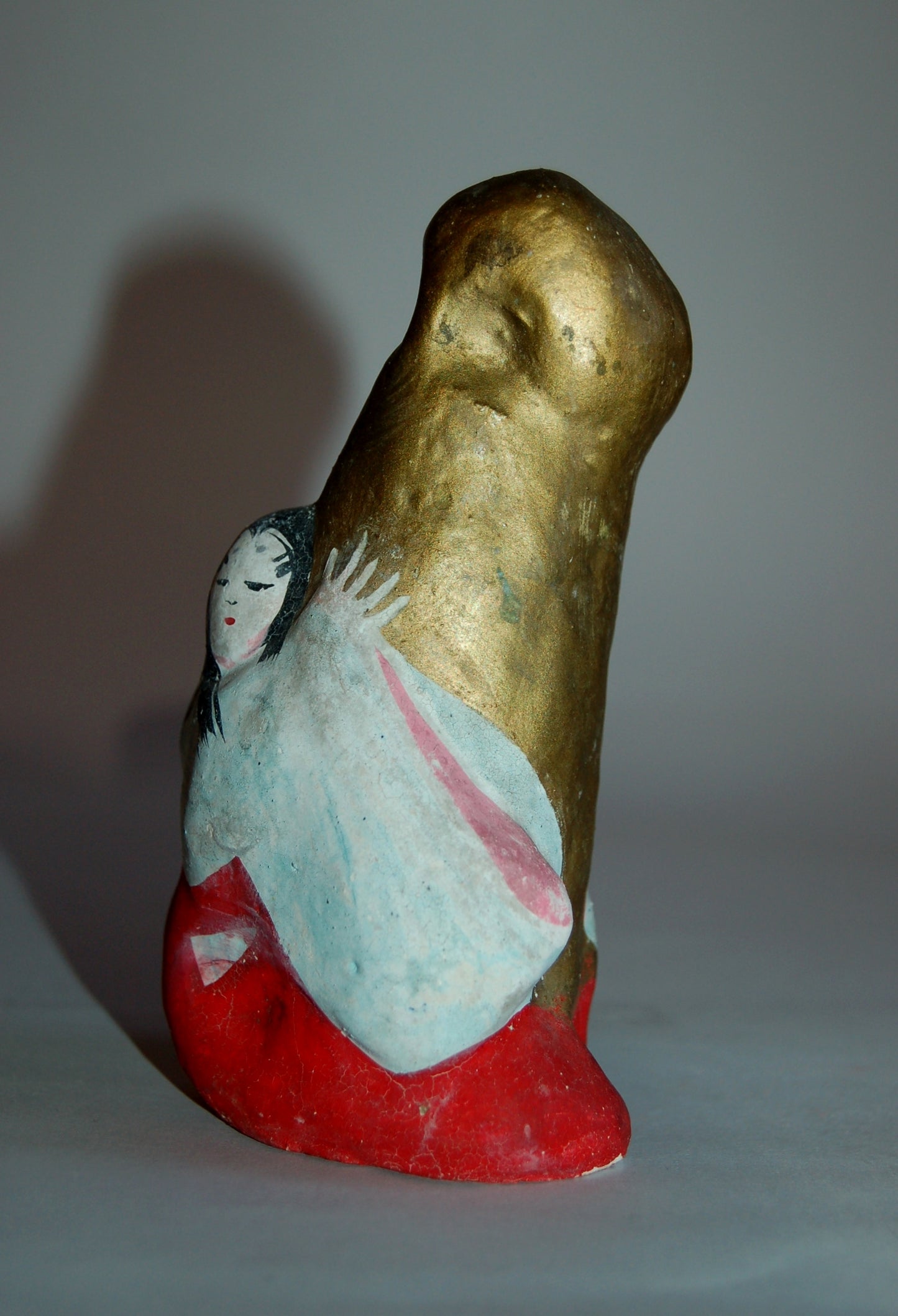 Court lady clutching matsudake mushroom, vintage kawara ningyo, clay erotic statue, Japan