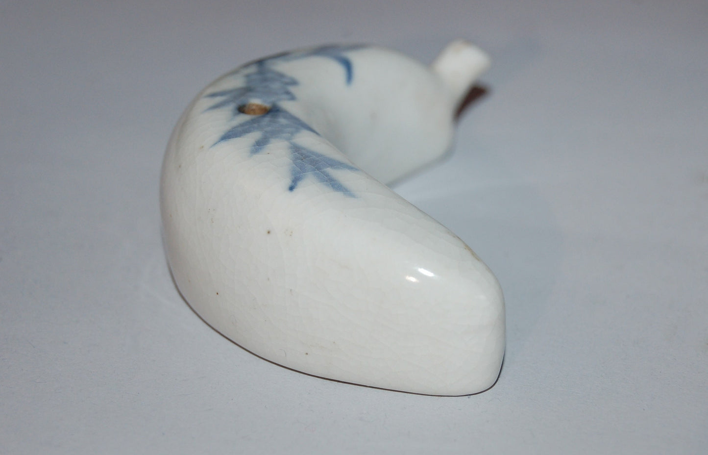 Blue and white porcelain suiteki water dropper, crescent moon and cherry blossom, Japan