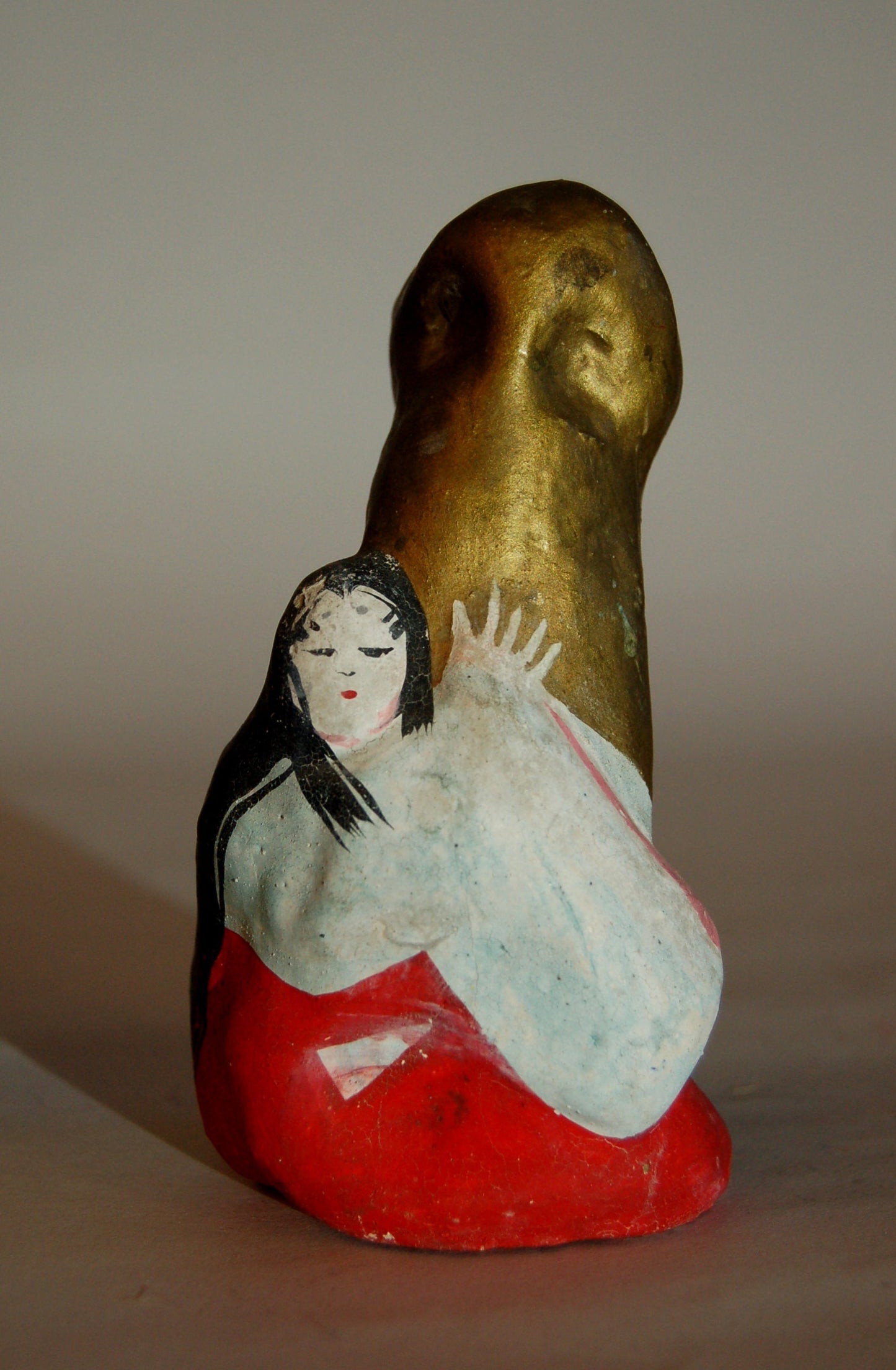 Court lady clutching matsudake mushroom, vintage kawara ningyo, clay erotic statue, Japan