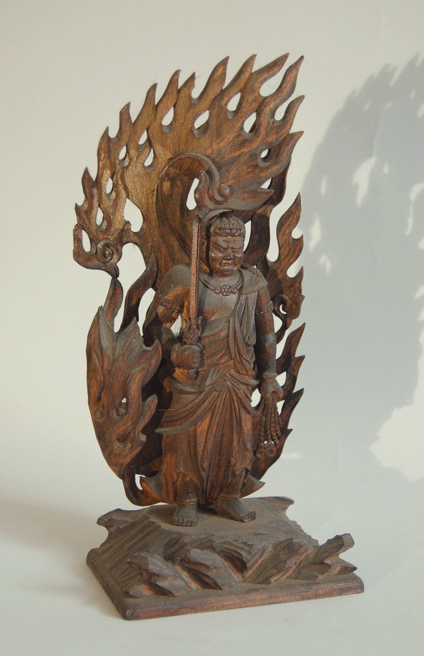 Statue of guardian deity Fudo Myoo surrounded by flames, cypress wood, Japan