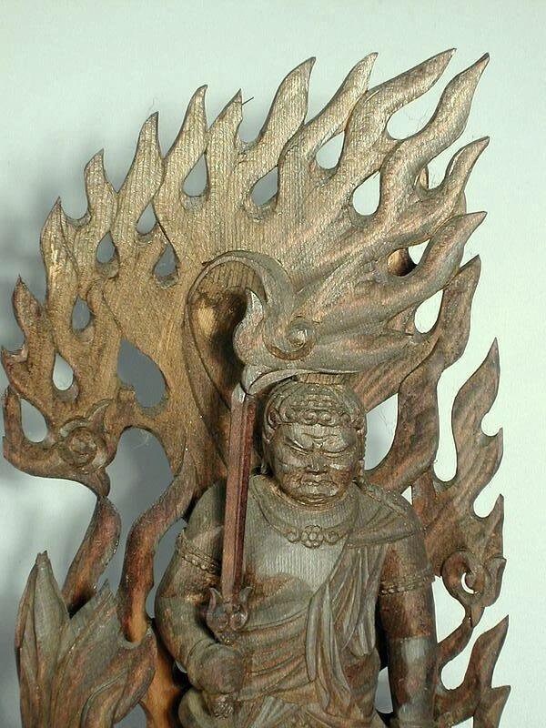 Statue of guardian deity Fudo Myoo surrounded by flames, cypress wood, Japan