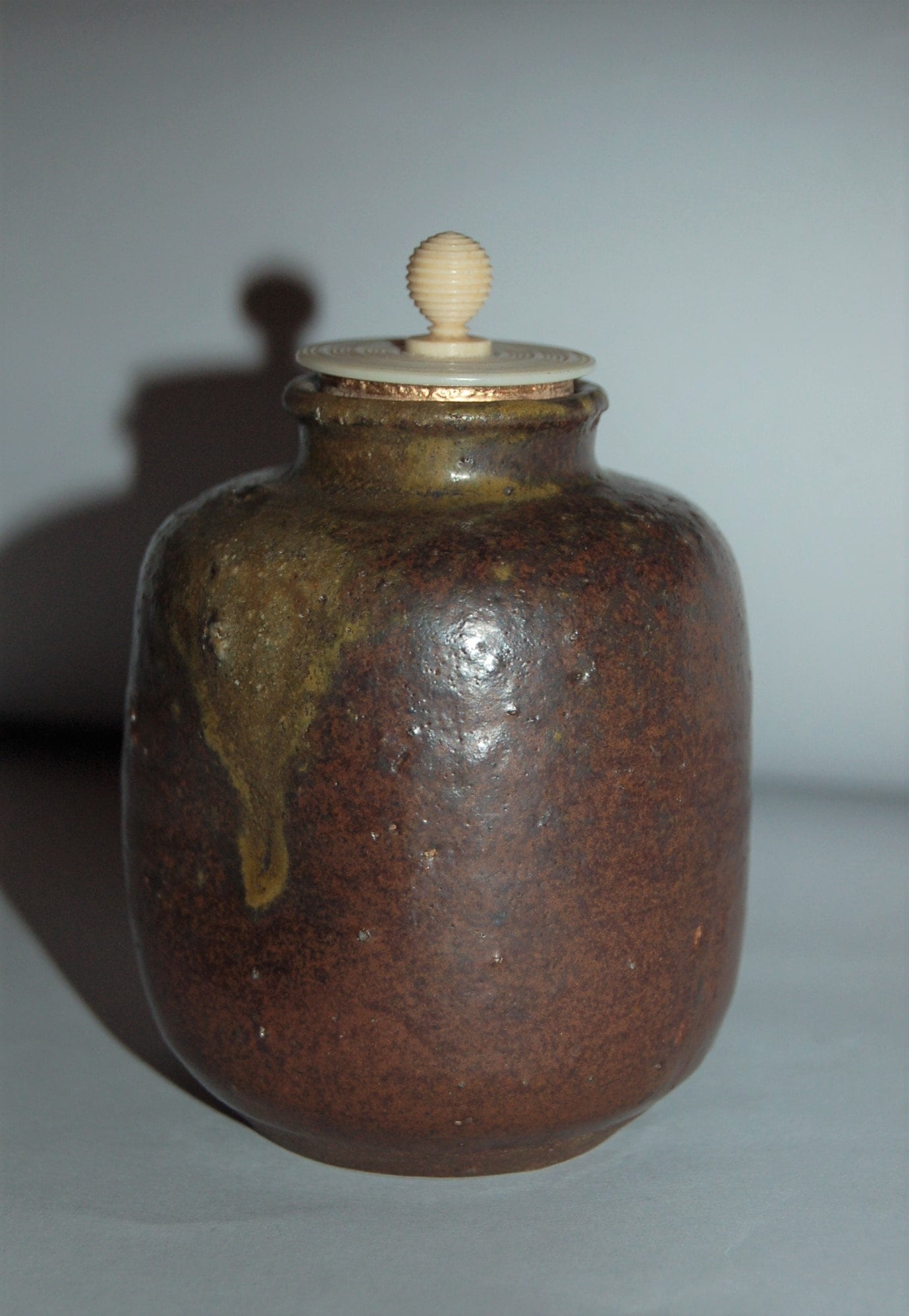 Antique ceramic chaire tea caddy, dark brown glaze, yellow drip, possibly Seto ware, Japan