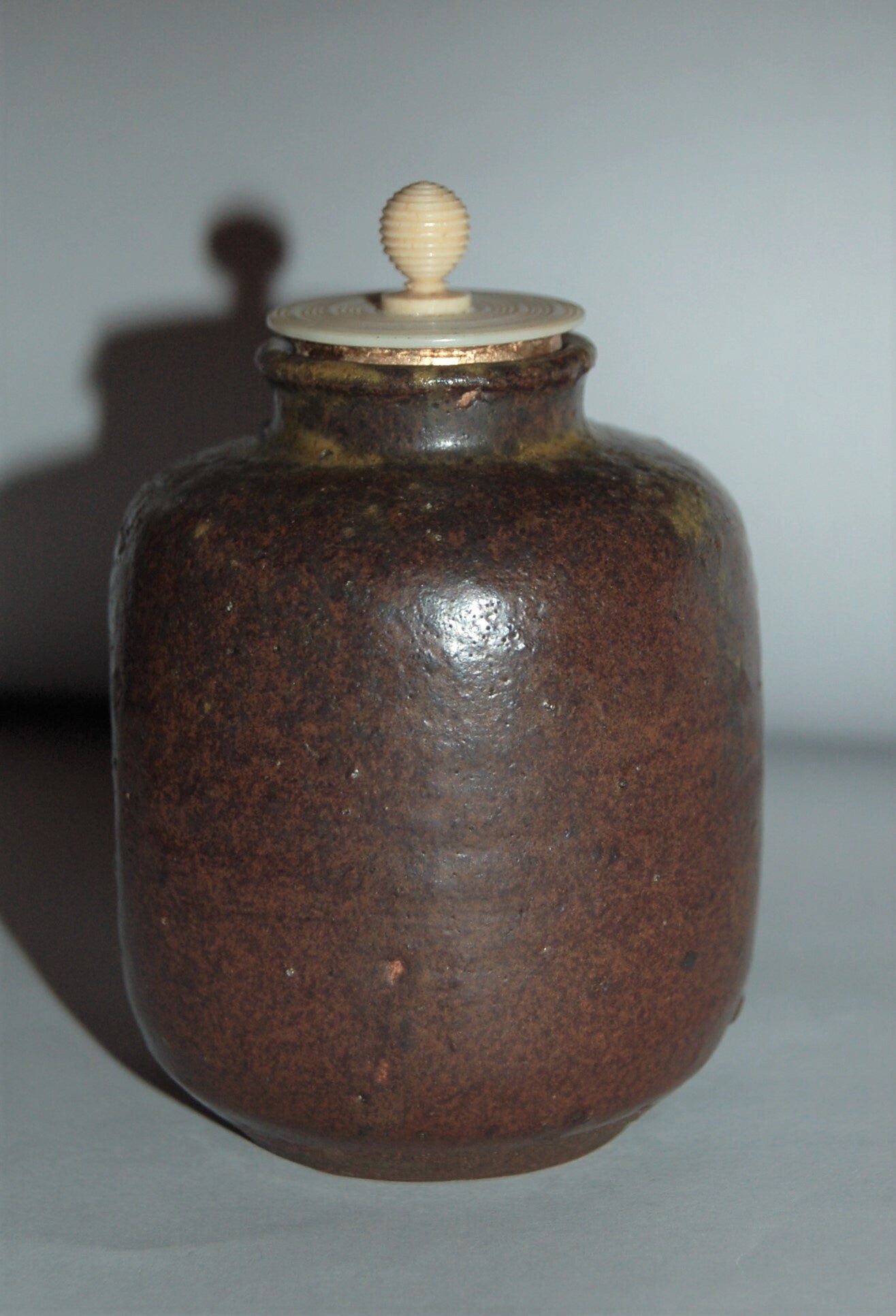 Antique ceramic chaire tea caddy, dark brown glaze, yellow drip, possibly Seto ware, Japan