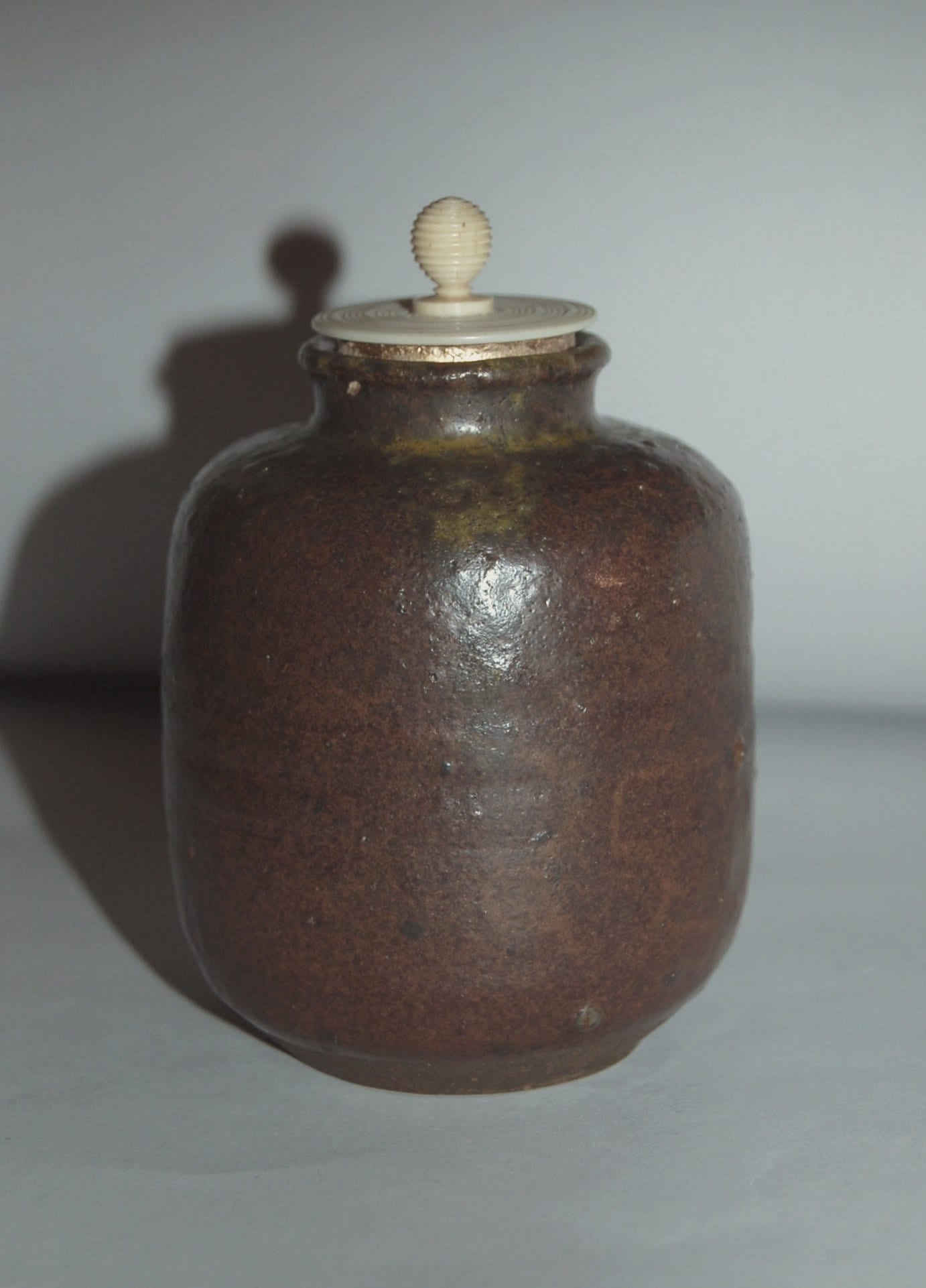 Antique ceramic chaire tea caddy, dark brown glaze, yellow drip, possibly Seto ware, Japan