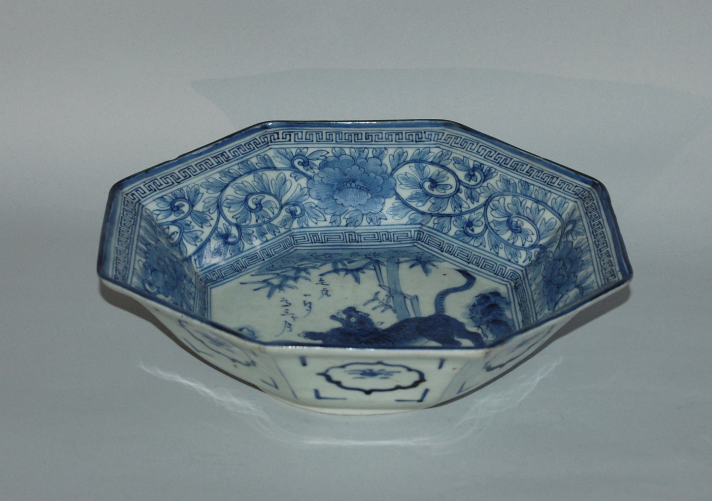 Porcelain sometsuke serving bowl, tiger and bamboo, poem, underglaze blue, Imari, Arita style, Japan